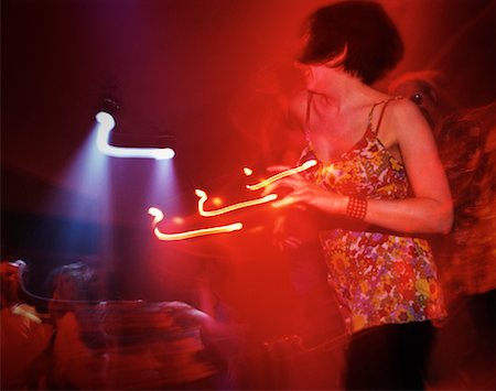 Blurred View of Woman Dancing in Club Stock Photo - Rights-Managed, Code: 700-00082330