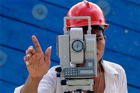 simsearch:700-00083195,k - Construction Worker Using Surveying Instrument Singapore Stock Photo - Rights-Managed, Code: 700-00082495