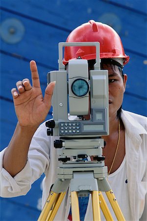 simsearch:700-00083195,k - Construction Worker Using Surveying Instrument Singapore Stock Photo - Rights-Managed, Code: 700-00082496