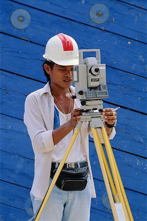 simsearch:700-00083195,k - Construction Worker Using Surveying Instrument Singapore Stock Photo - Rights-Managed, Code: 700-00082497