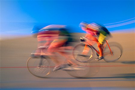 simsearch:700-00522779,k - Blurred View of Bike Race Foto de stock - Con derechos protegidos, Código: 700-00082747