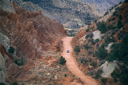 rough rocky road - Vehicle on Dirt Road Through Mountains, Grand Staircase Escalante National Monument Utah, USA Stock Photo - Rights-Managed, Code: 700-00082809