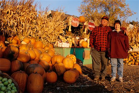 Portrait of Mature Couple at Farm Stand in Autumn Stratham, New Hampshire, USA Stock Photo - Rights-Managed, Code: 700-00082893