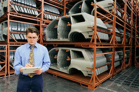 Mann schreiben im Audi-Werk Ingolstadt, Deutschland Stockbilder - Lizenzpflichtiges, Bildnummer: 700-00082919