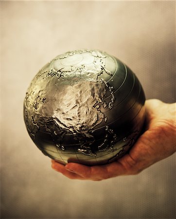 Globe in Palm of Hand Pacific Rim Stock Photo - Rights-Managed, Code: 700-00083087