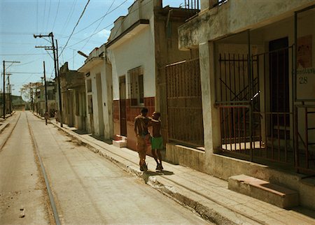 Back View of Two Boys Walking on Street Regla, Cuba Stock Photo - Rights-Managed, Code: 700-00083334