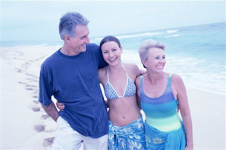 peter griffith - Mature Mother, Father and Daughter Walking on Beach Stock Photo - Rights-Managed, Code: 700-00083474