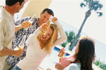 Group of People with Drinks Dancing Outdoors Stock Photo - Rights-Managed, Code: 700-00083550