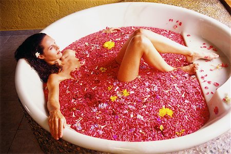 simsearch:600-01788630,k - Woman in Bathtub with Flower Petals Stock Photo - Rights-Managed, Code: 700-00083744