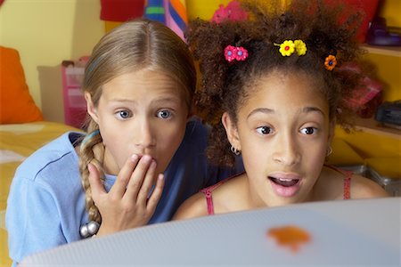 shocked teen computer - Two Girls Using Computer Stock Photo - Rights-Managed, Code: 700-00083950