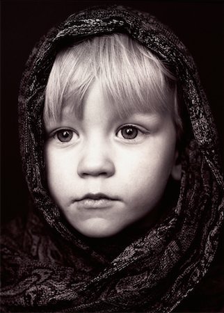 sad boy in black and white - Portrait of Child with Head Wrapped in Scarf Stock Photo - Rights-Managed, Code: 700-00083960