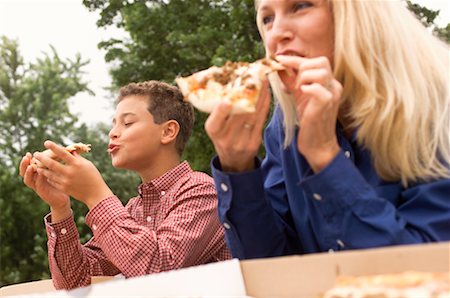 simsearch:700-00077839,k - Mother and Son Eating Pizza Stock Photo - Rights-Managed, Code: 700-00094546