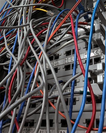 simsearch:700-00362043,k - Tangled Cables in Server Room Fotografie stock - Rights-Managed, Codice: 700-00094592