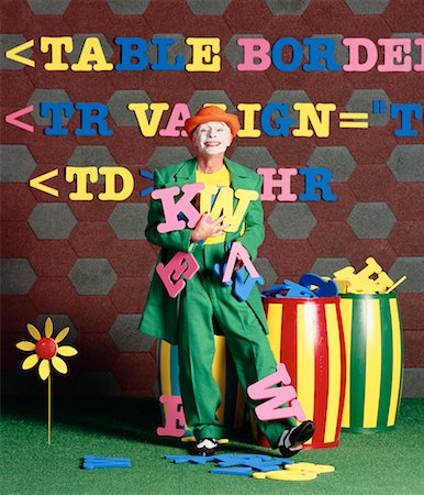 espetáculo amador - Clown with Barrel of Letters for HTML Code Foto de stock - Direito Controlado, Número: 700-00094710