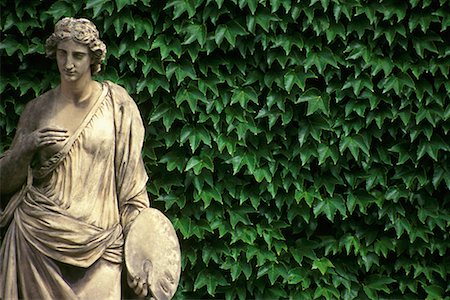 Statue Against Ivy Wall Montmartre, Paris, France Stock Photo - Rights-Managed, Code: 700-00094815