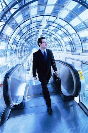 Businessman on Escalator Stock Photo - Rights-Managed, Code: 700-00095466