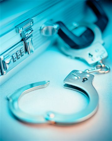 simsearch:700-00161018,k - Briefcase and Handcuffs Stock Photo - Rights-Managed, Code: 700-00095542