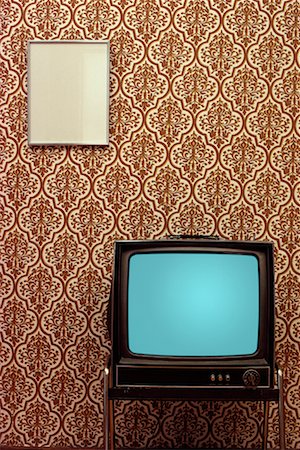 Television Against Patterned Wall Stock Photo - Rights-Managed, Code: 700-00095797