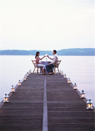 dinner on pier at lake - Couple on a Date Stock Photo - Rights-Managed, Code: 700-00095887