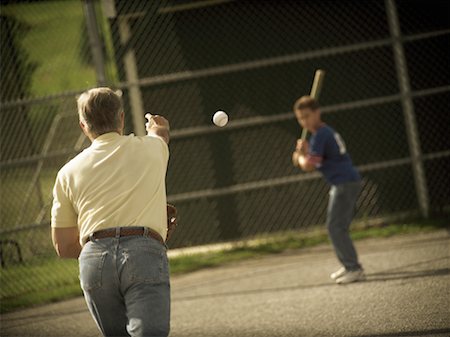 family baseball game - Father and Son Playing Baseball Stock Photo - Rights-Managed, Code: 700-00095955