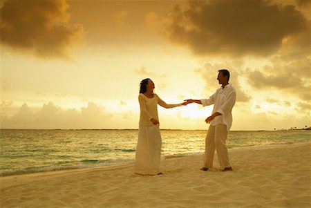 paradise island bahamas beach - Couple Holding Hands on Beach Paradise Island, Bahamas Stock Photo - Rights-Managed, Code: 700-00096383
