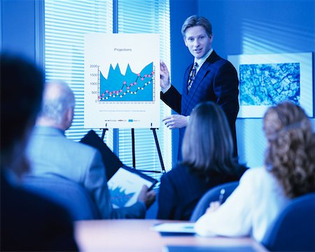Businessman Giving Presentation Stock Photo - Rights-Managed, Code: 700-00096617