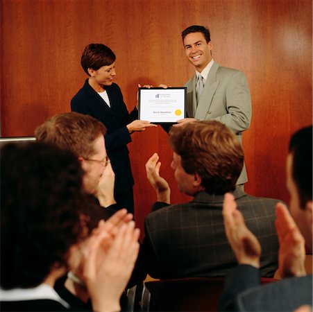 picture of person receiving diploma - Woman Being Presented With Diploma Stock Photo - Rights-Managed, Code: 700-00096762