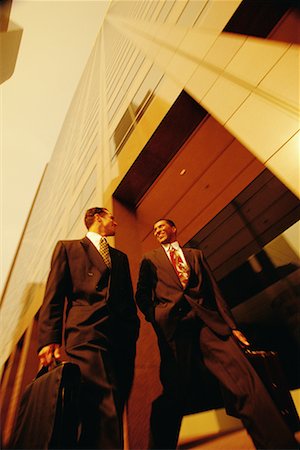 skyscraper company suit - Businessmen Walking Through Financial District Stock Photo - Rights-Managed, Code: 700-00096877