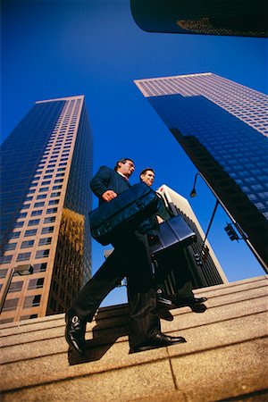 skyscraper company suit - Businessmen Walking Through Financial District Stock Photo - Rights-Managed, Code: 700-00096872