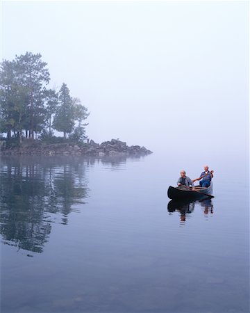 secluded lake woman - Mature Couple in Canoe Stock Photo - Rights-Managed, Code: 700-00097035