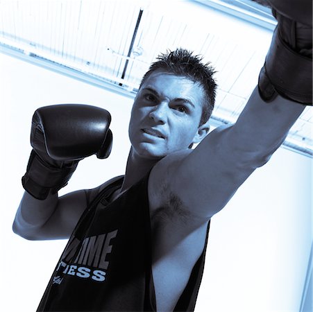 Young Man Kickboxing Stock Photo - Rights-Managed, Code: 700-00097572