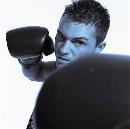 Young Man Kickboxing Stock Photo - Rights-Managed, Code: 700-00097573