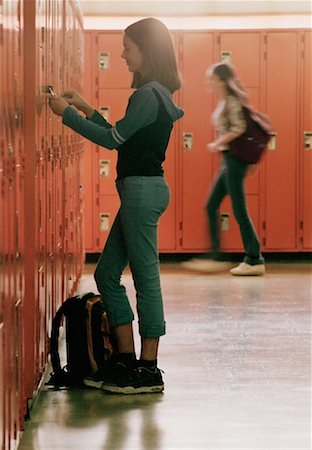 Student at Locker in School Hallway Stock Photo - Rights-Managed, Code: 700-00097608