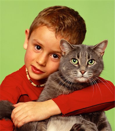 simsearch:700-00098404,k - Child Hugging Cat Fotografie stock - Rights-Managed, Codice: 700-00098406