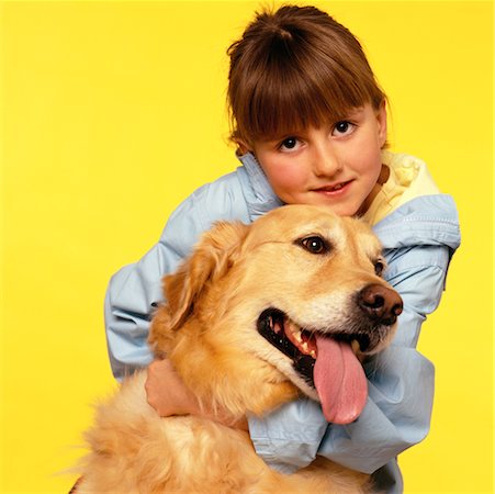 simsearch:700-00098404,k - Child Hugging Dog Fotografie stock - Rights-Managed, Codice: 700-00098407