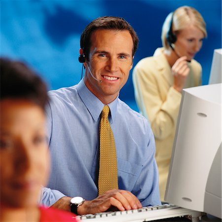 Businessman With Telephone Headset Stock Photo - Rights-Managed, Code: 700-00098608