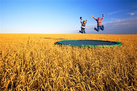 Girls on Trampoline Stock Photo - Rights-Managed, Code: 700-00098658