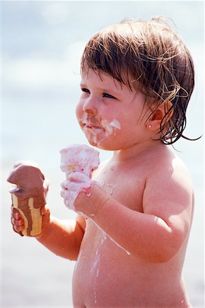 simsearch:700-02693925,k - Toddler Eating Ice Cream Cone Foto de stock - Con derechos protegidos, Código: 700-00099132