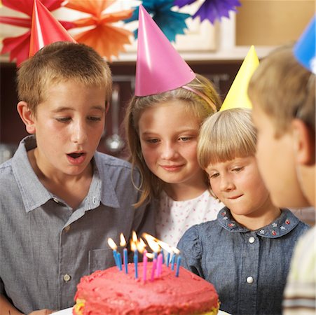 simsearch:700-00085722,k - Blowing Out Birthday Candles Stock Photo - Rights-Managed, Code: 700-00099406