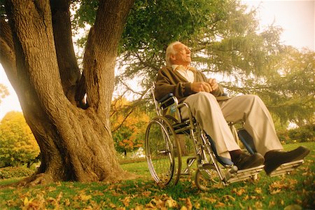 simsearch:700-00099922,k - Mature Man in Wheelchair Outdoors Foto de stock - Con derechos protegidos, Código: 700-00099921