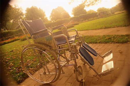 Empty Wheelchair Outdoors Stock Photo - Rights-Managed, Code: 700-00099923