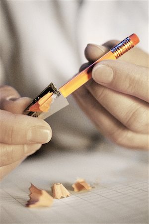 sharpening pencils - Hands Sharpening Pencil Stock Photo - Rights-Managed, Code: 700-00090027