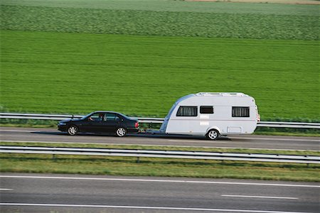 Car With Trailer on Highway Stock Photo - Rights-Managed, Code: 700-00090565