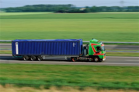 side view of a semi truck - Transport Truck on Highway Stock Photo - Rights-Managed, Code: 700-00090562
