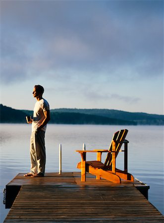 Man Standing on Dock Stock Photo - Rights-Managed, Code: 700-00090936