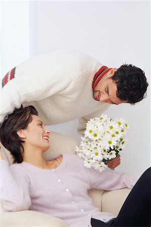 flower bending over - Man Giving Woman Flowers Stock Photo - Rights-Managed, Code: 700-00091324