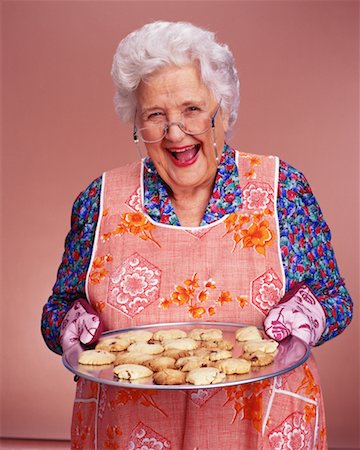 smelling old people - Woman With Cookies Stock Photo - Rights-Managed, Code: 700-00091748