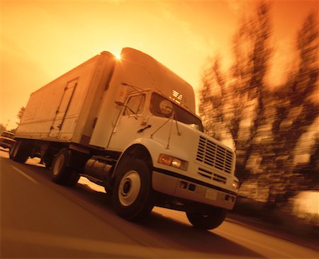 sunset road drive truck - Transport Truck Stock Photo - Rights-Managed, Code: 700-00092545