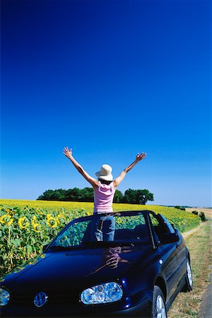 Woman Standing in Convertible Stock Photo - Rights-Managed, Code: 700-00092556