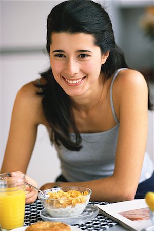 simsearch:700-00592522,k - Woman Eating Breakfast Stock Photo - Rights-Managed, Code: 700-00092591